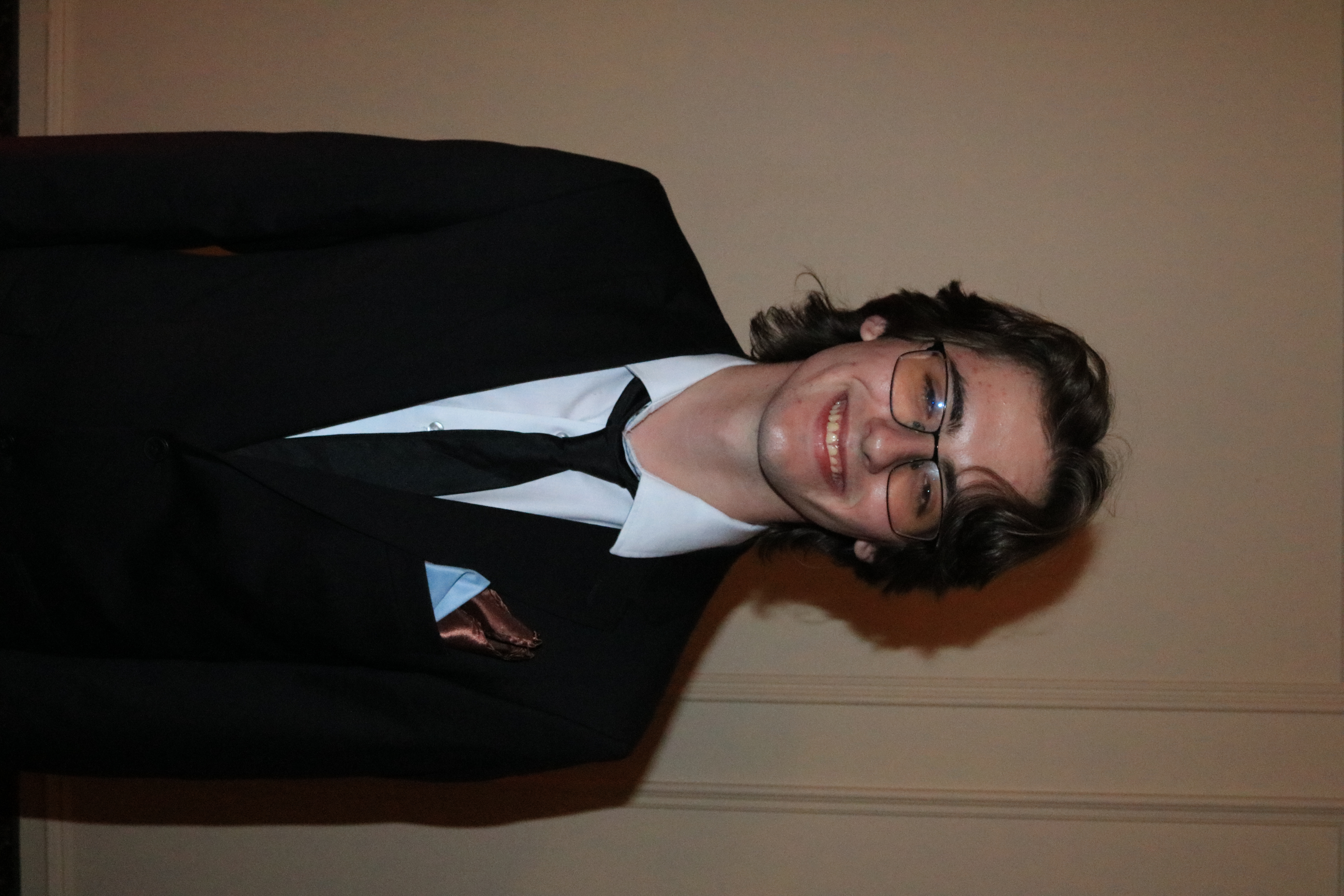 Young Man in a Suit