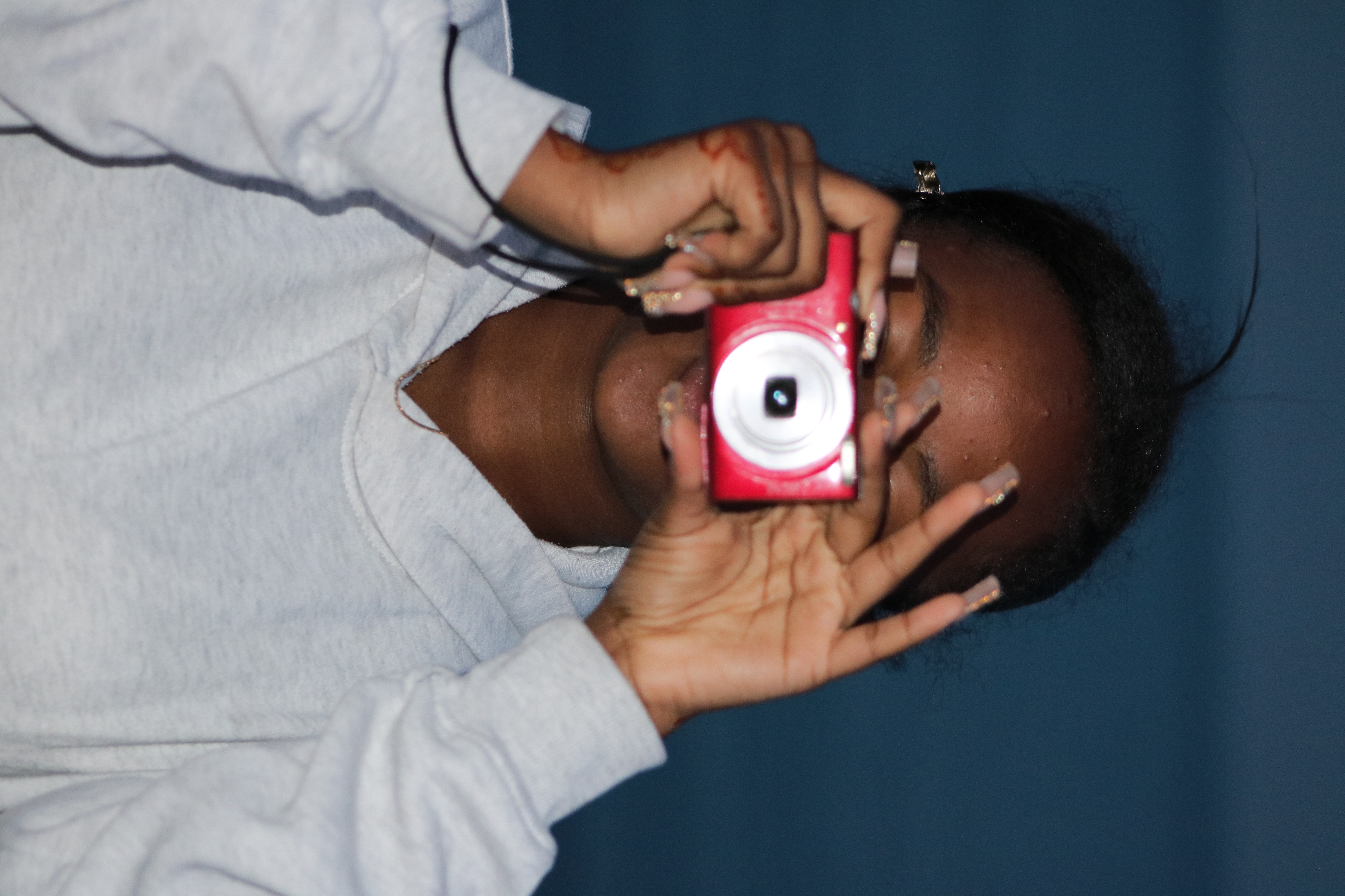 Young Woman with Camera